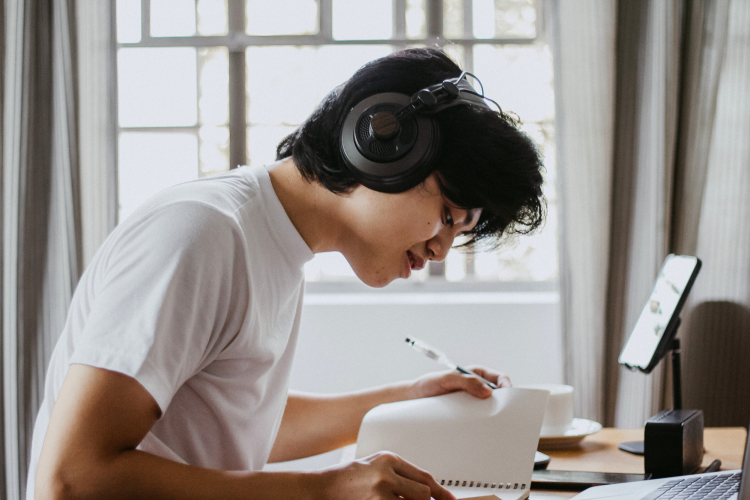 Student Studying in Headphones