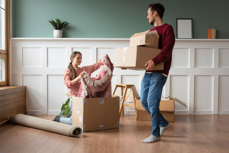 young couple moving into new home