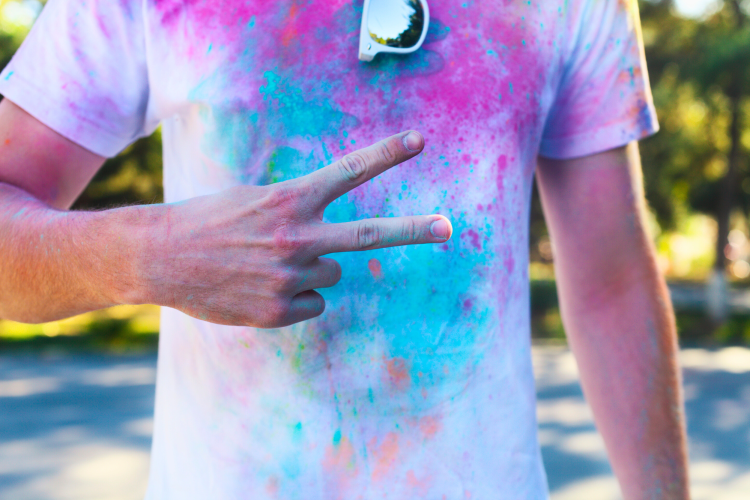 close up man with paint on his t-shirt