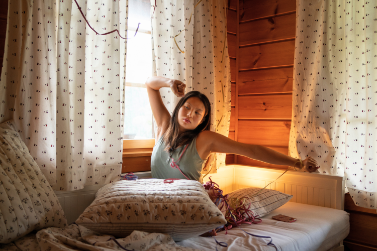 full shot teenage girl waking up ritual