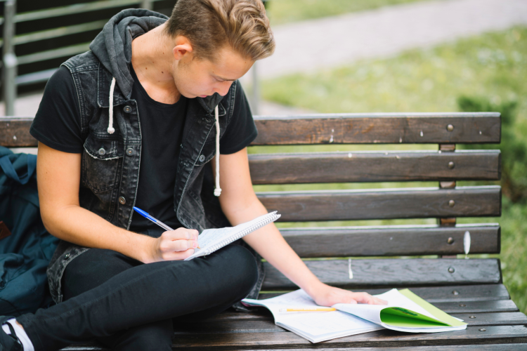 student learning lecture bench