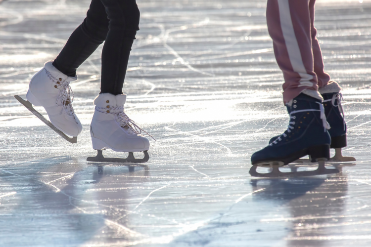 Couple Ice Skating for date idea in Omaha
