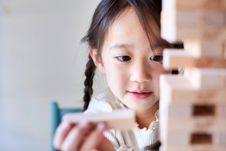 Removing the blocks from the Jenga tower