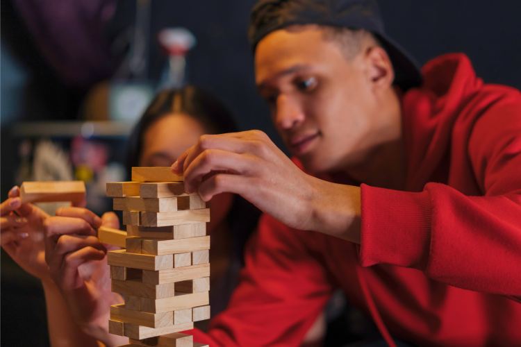 Touching the Jenga tower with two hands