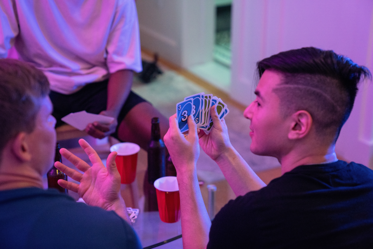 Man holding Uno cards
