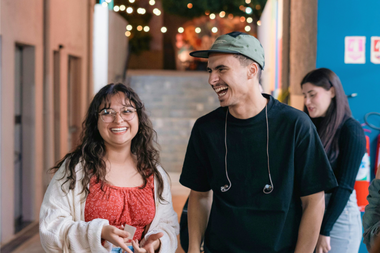 Two friends laughing together