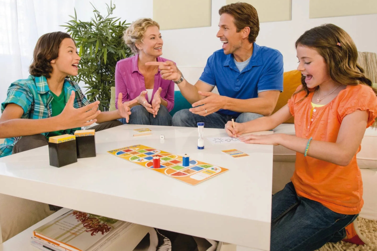 family playing pictionary for fun