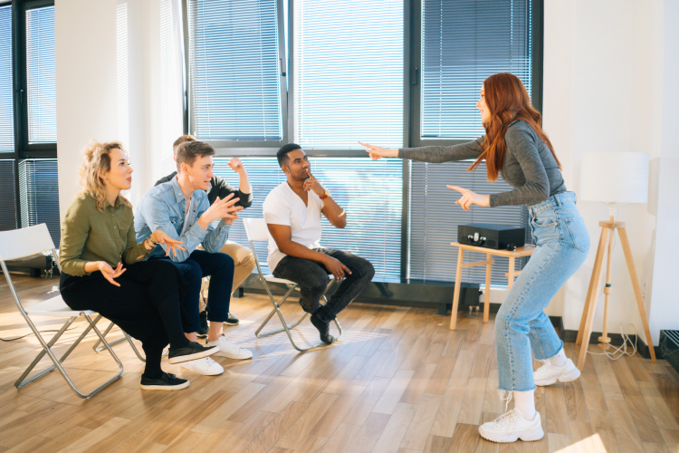 group of friends playing charades