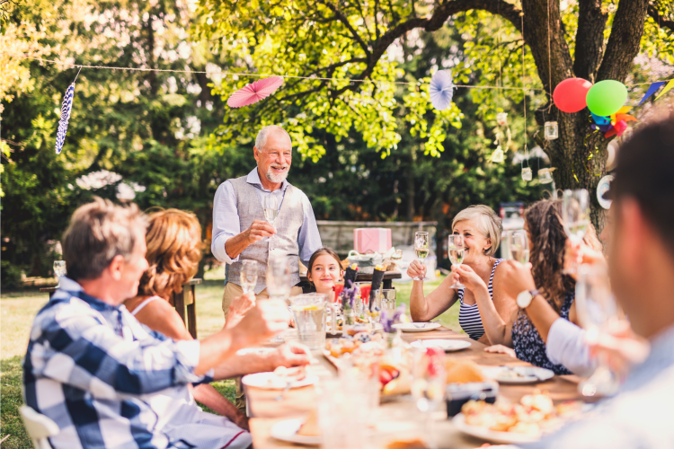 family throwing a backyard party