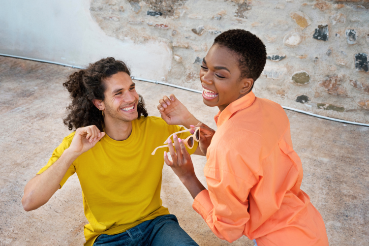 Two friends laughing and playing