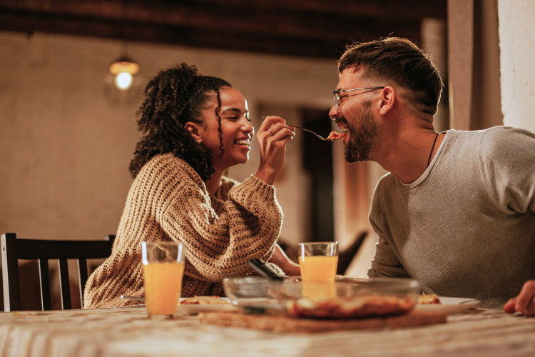 couple eating a romantic meal together