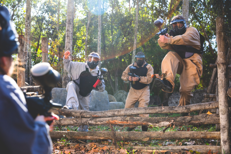 people playing paintball