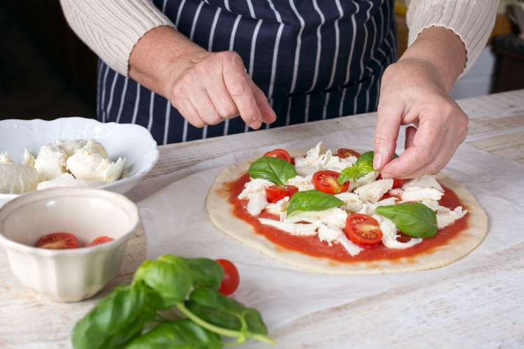 Take a cooking class to learn to make the best Boston pizza.