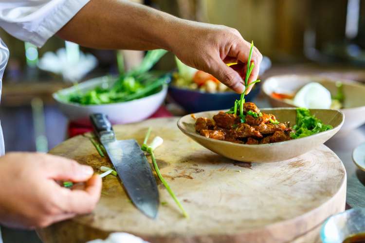 A cooking class is a romantic date idea in Vancouver.