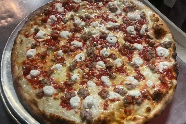 Iconic John's of Bleecker Street serves some of the best pizza in Manhattan.