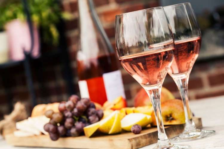 sparkling rose wine with fruit and cheese