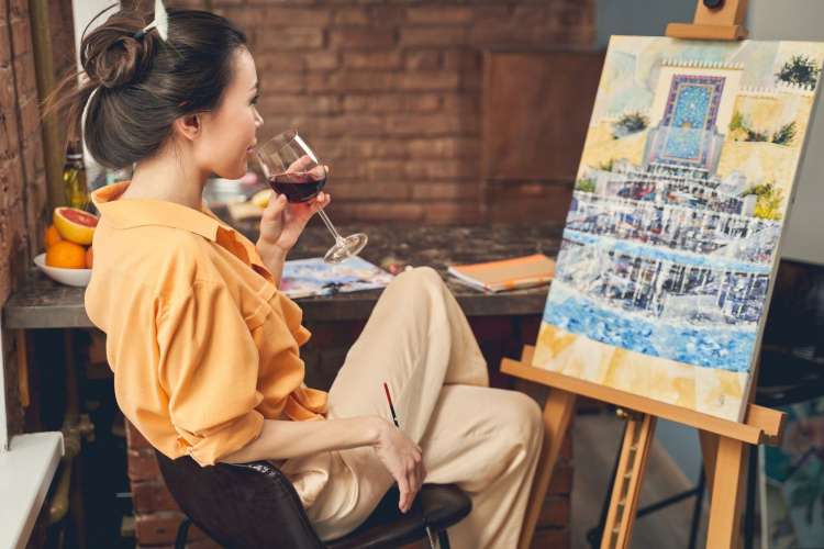 A painting and sipping event is a great team building activity in Denver