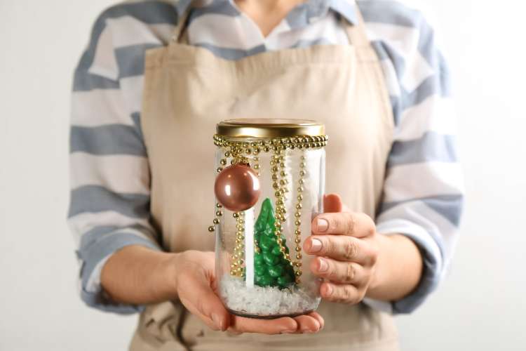 Making a snow globe is a fun gift card presentation idea.