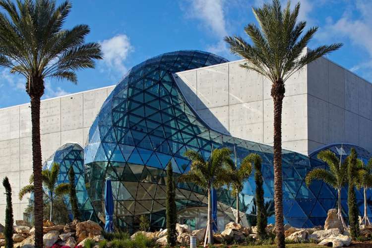 Exterior of the Dali Museum's snake-like glass corridor 