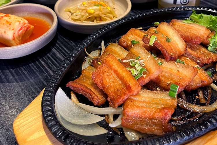 Three-layered pork is some of the most delicious Korean BBQ in NYC.