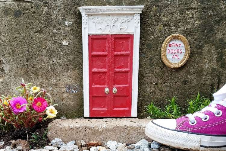 look for the tiny doors art installations for a fun thing to do in atlanta