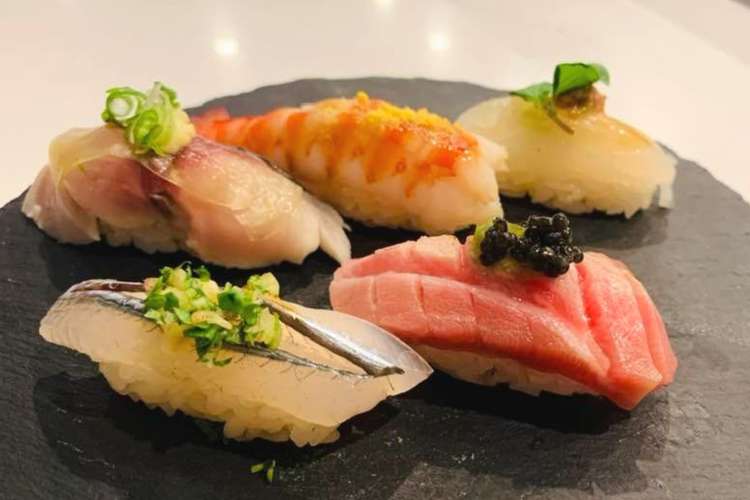 a platter of nigiri sushi