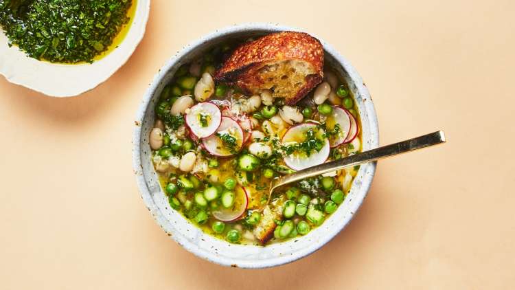 white bean and spring vegetable stew is a spring recipe to brighten up your table