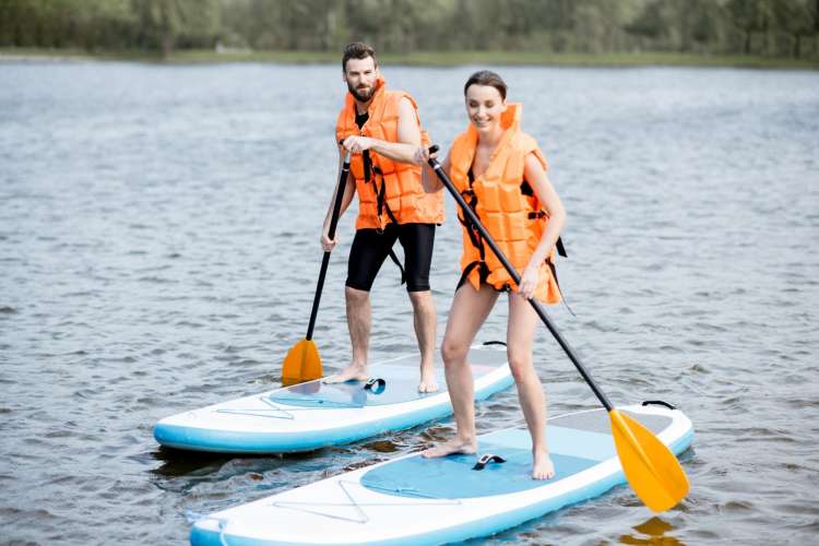 Paddleboarding is an excellent team building activity in Denver