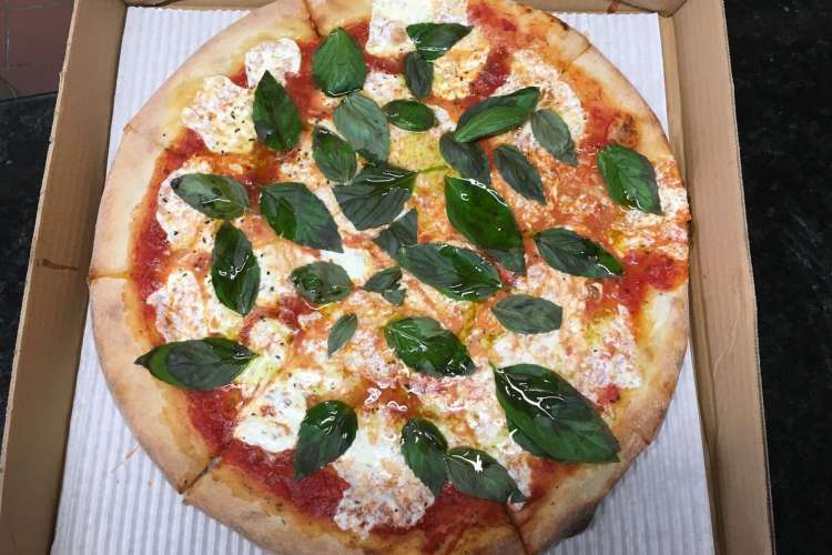 a Margherita pizza from Papa's Pizza Company