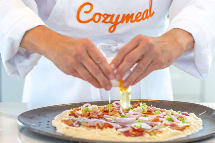 chef plating food during a cooking class