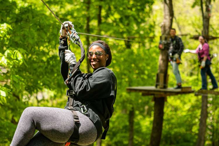 ziplining in nashville's adventure park is a fun thing to do in nashville