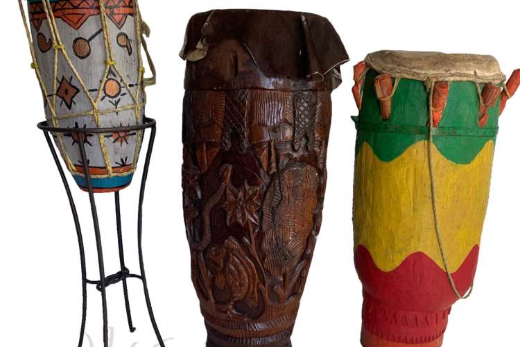 three colorful traditional drums used in voodoo