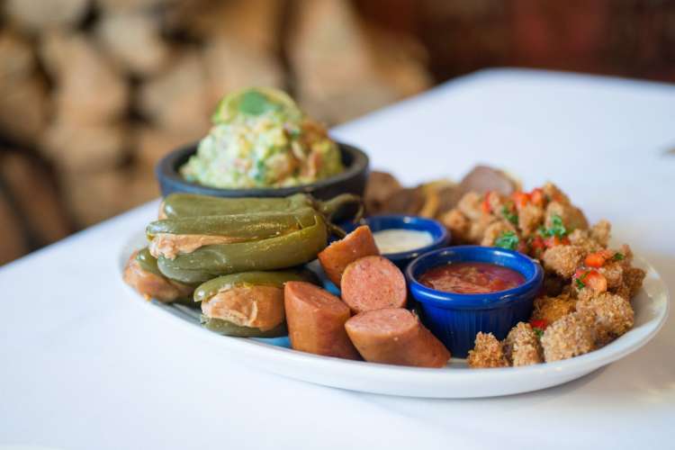 a platter peanut butter stuffed peppers and sausages from The Fort