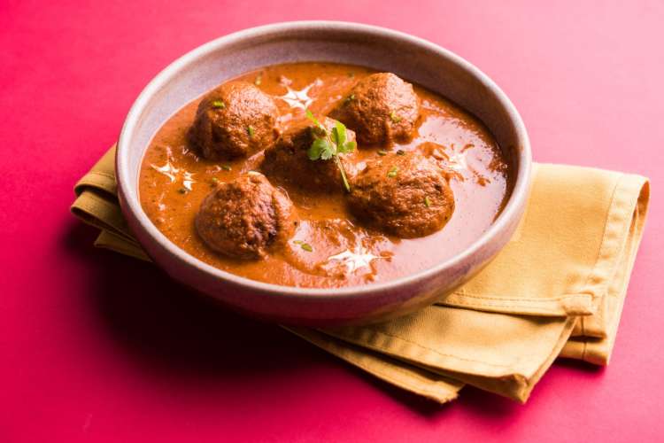 Indian dumplings, malai kofta, in a red sauce