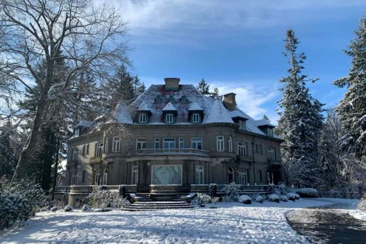 exterior of pittock mansion in portland in the snow