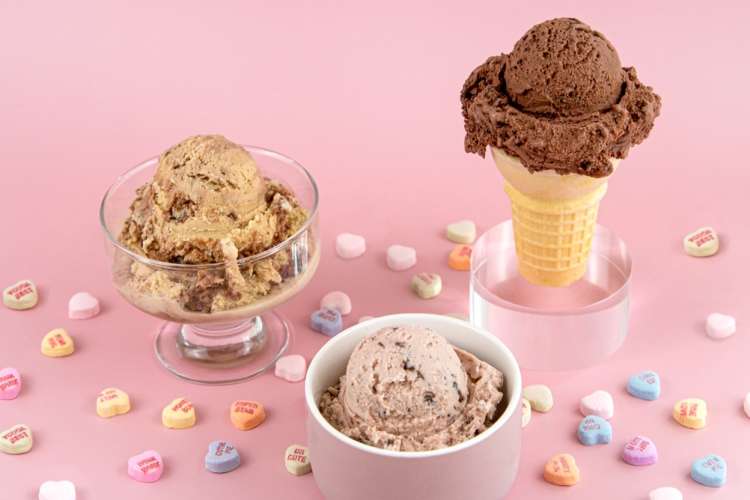 homemade ice cream in dishes with a pink backdrop at mitchell's ice cream