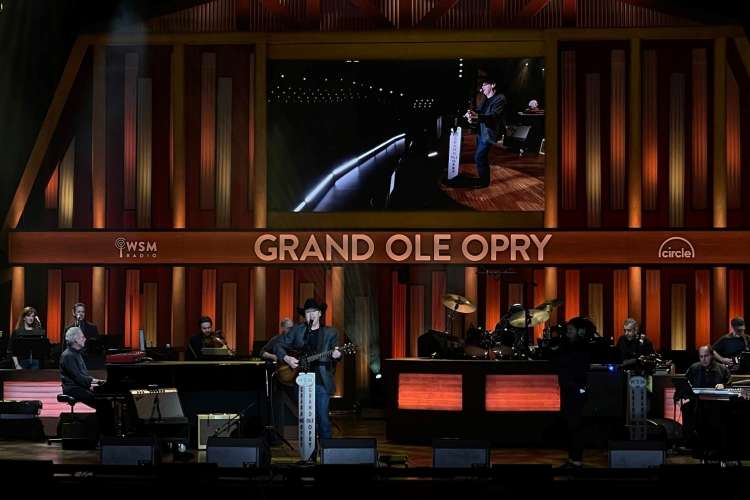 country music performer on stage at the grand ole opry