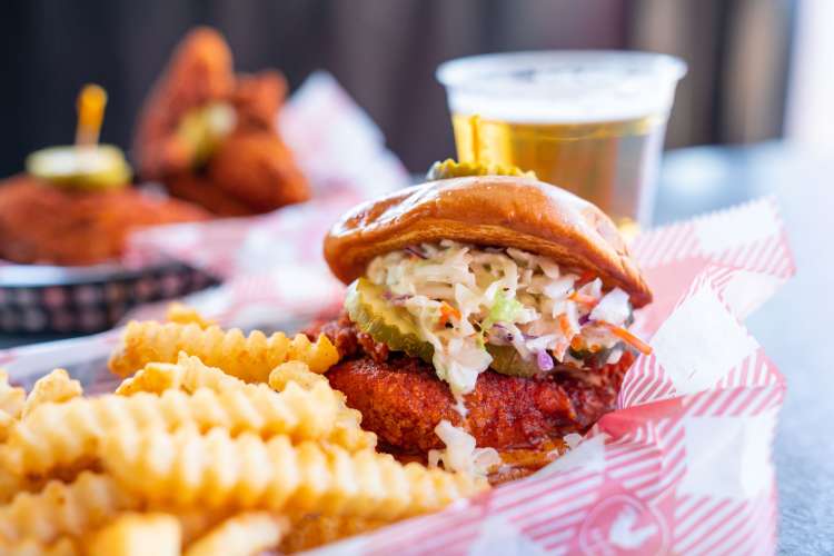 hattie b's hot chicken sandwich with crinkle cut fries