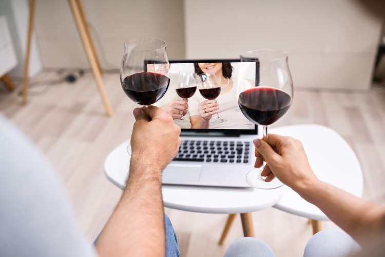 couple enjoying a virtual wine tasting