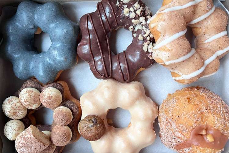 a colourful array of mochi doughnuts