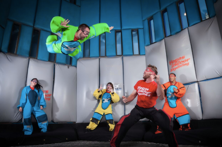 Five people experiencing a flying session at Vegas Indoor Skydiving