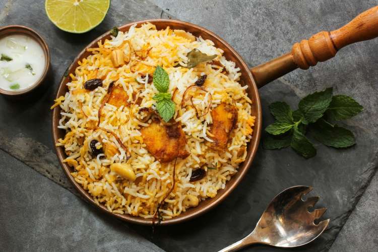 a platter of fish biryani, an Indian rice-based dish