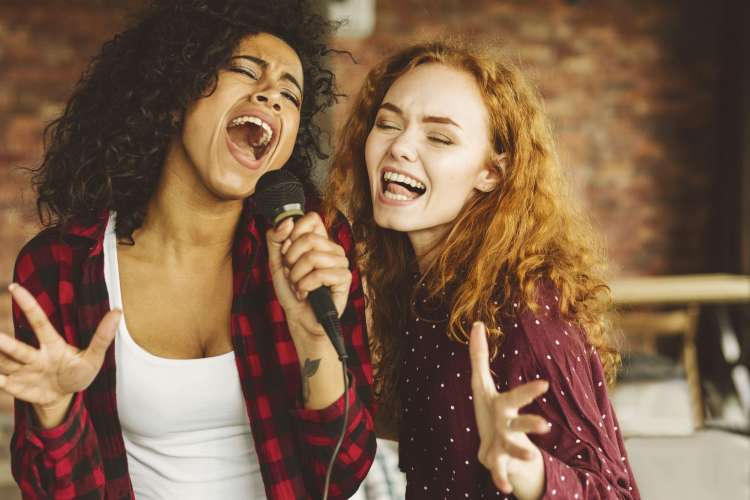 Karaoke is a great first date idea to break the ice.