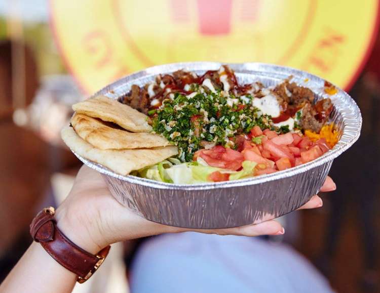 the halal guys is one of the best places to eat in nyc that isn't a restaurant