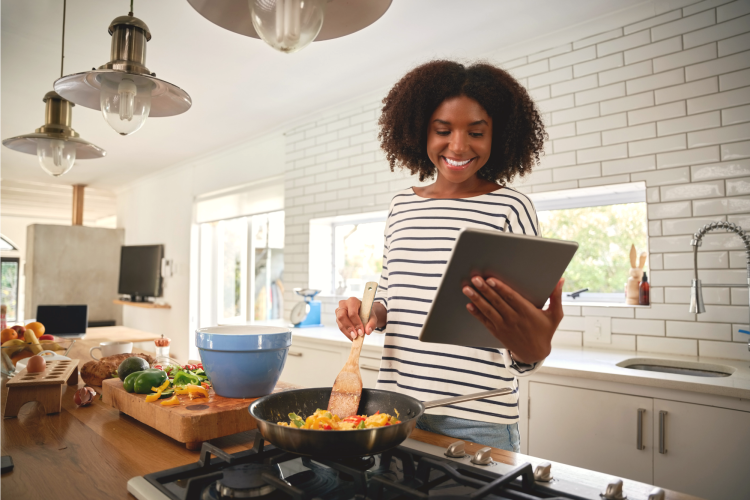 woman taking an online cooking class