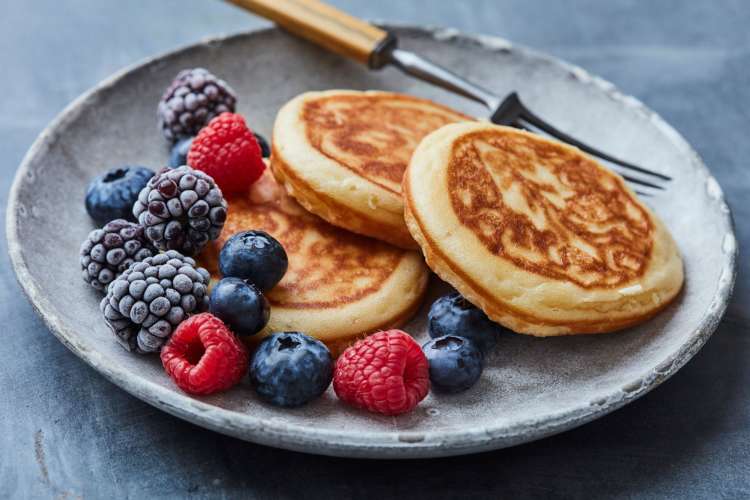 Berries and pancakes on a plate