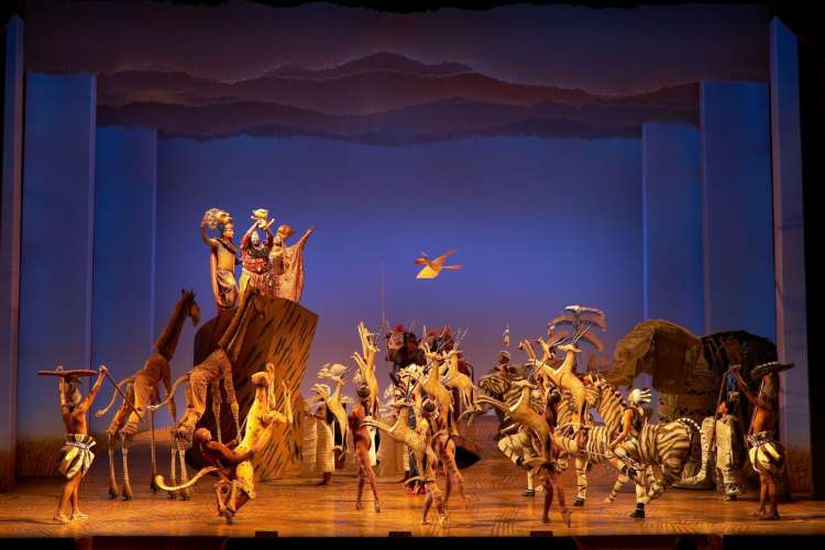 action scene from a stage production of The Lion King