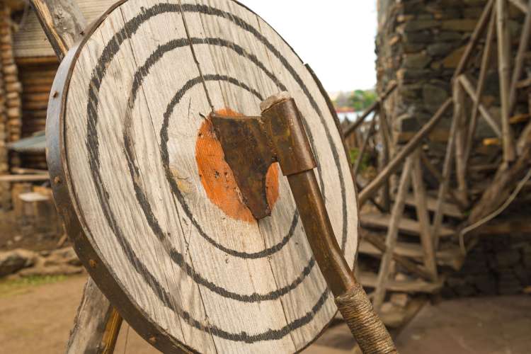 Axe throwing is a unique team building activity in San Antonio.