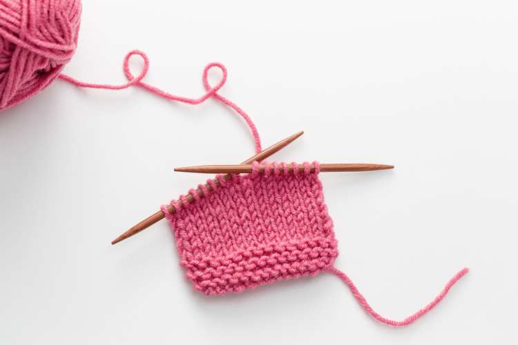 a pink knitted sleeve