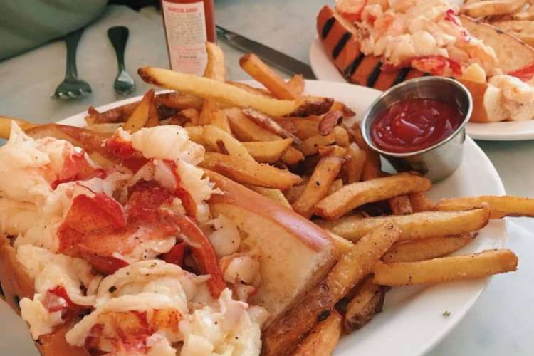 a lobster roll and french fries